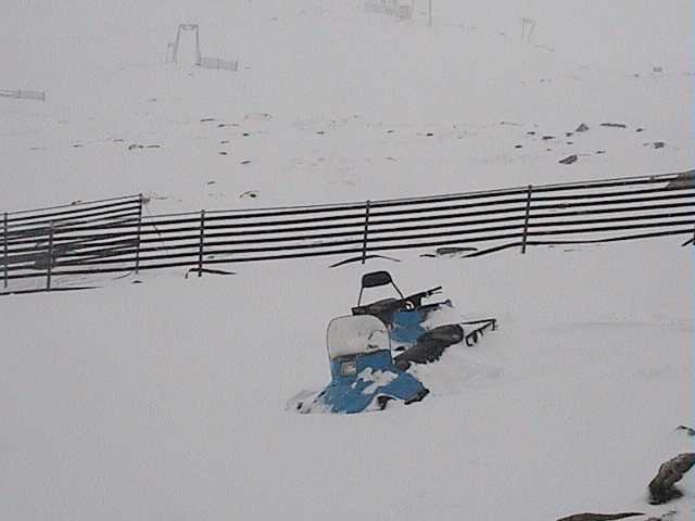 2 snow-mobiles abandoned to the snows at the top of Crackenback � Sunday morning