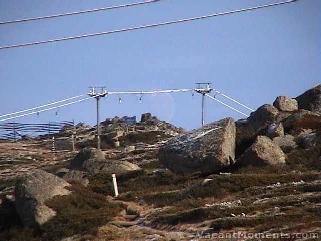 Ice sitting on Karel’s T-Bar with moon behind